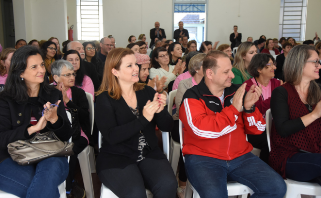 Público sentado em um auditório