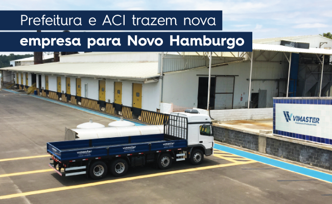 Um caminhão estacionado emum estacionamento com prédios aos fundo